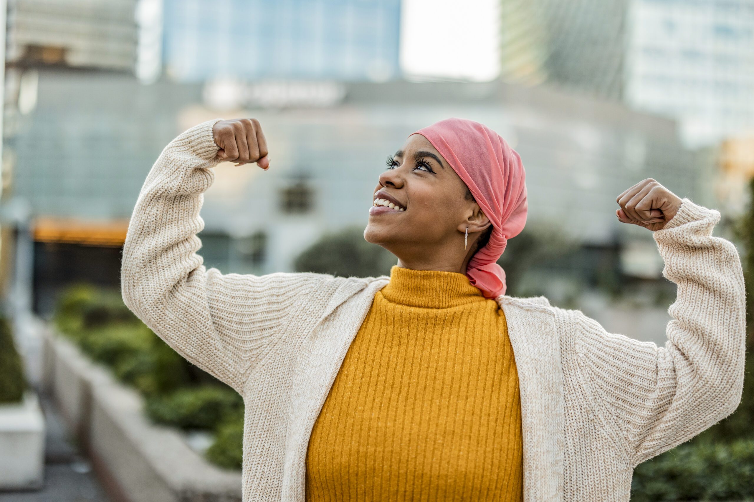 Empowered Cancer Survivor Celebrating Strength